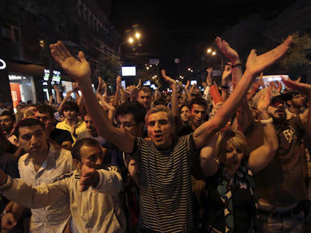 Armenian gunmen surrender, standoff ends with two police officers killed