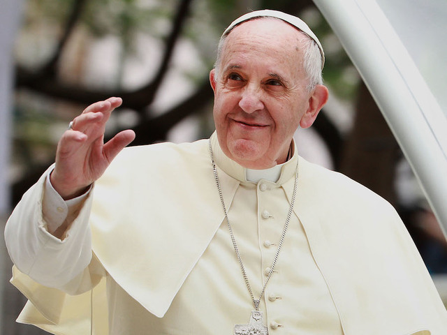 Posters critical of Pope Francis appear around city