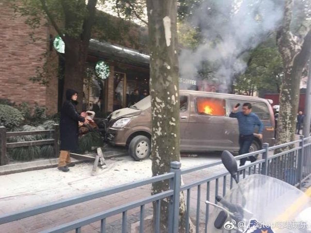 Vehicle catches fire, crashes into pedestrians in downtown Shanghai